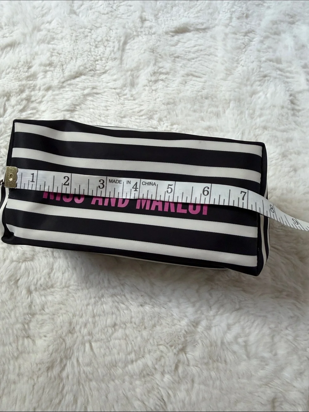 KATE SPADE,  black and white striped makeup pouch
